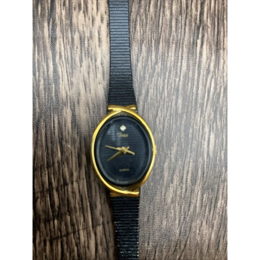Timex Women's Watch Unique gold bevel. Working, New Battery Black Metal Band